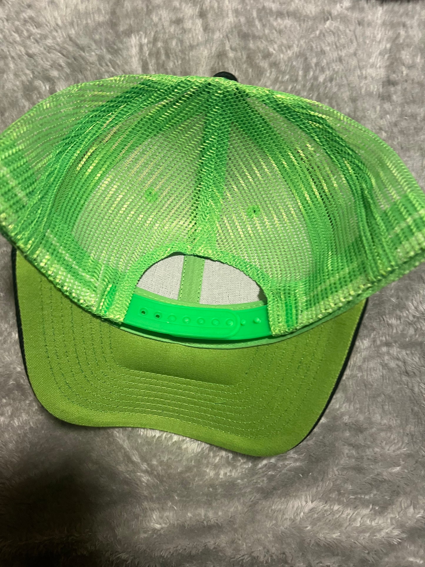 Green black hat
